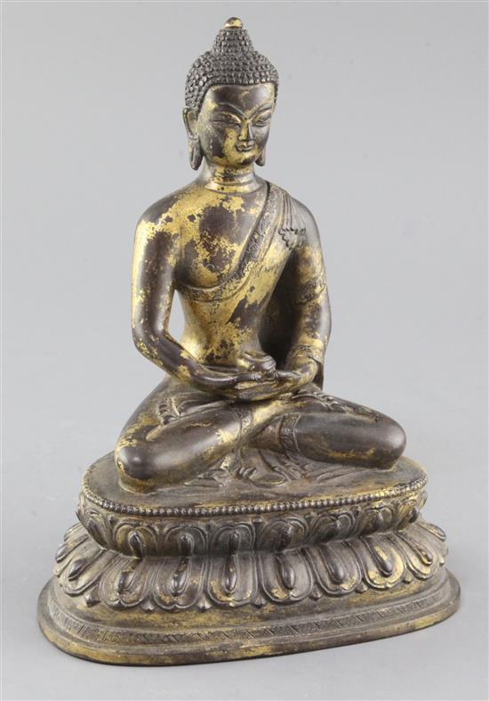 A Chinese gilt bronze seated figure of Buddha Shakyamuni, height 23cm